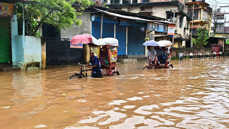 hindistanda sel ve heyelanlar 18 kisinin olumune yol acti cuH5JHXd